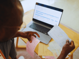 homeowner paying utility bills