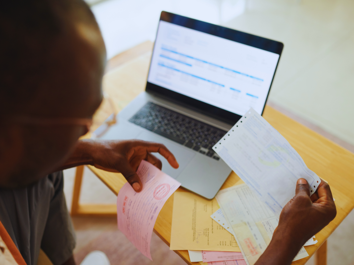 homeowner paying utility bills