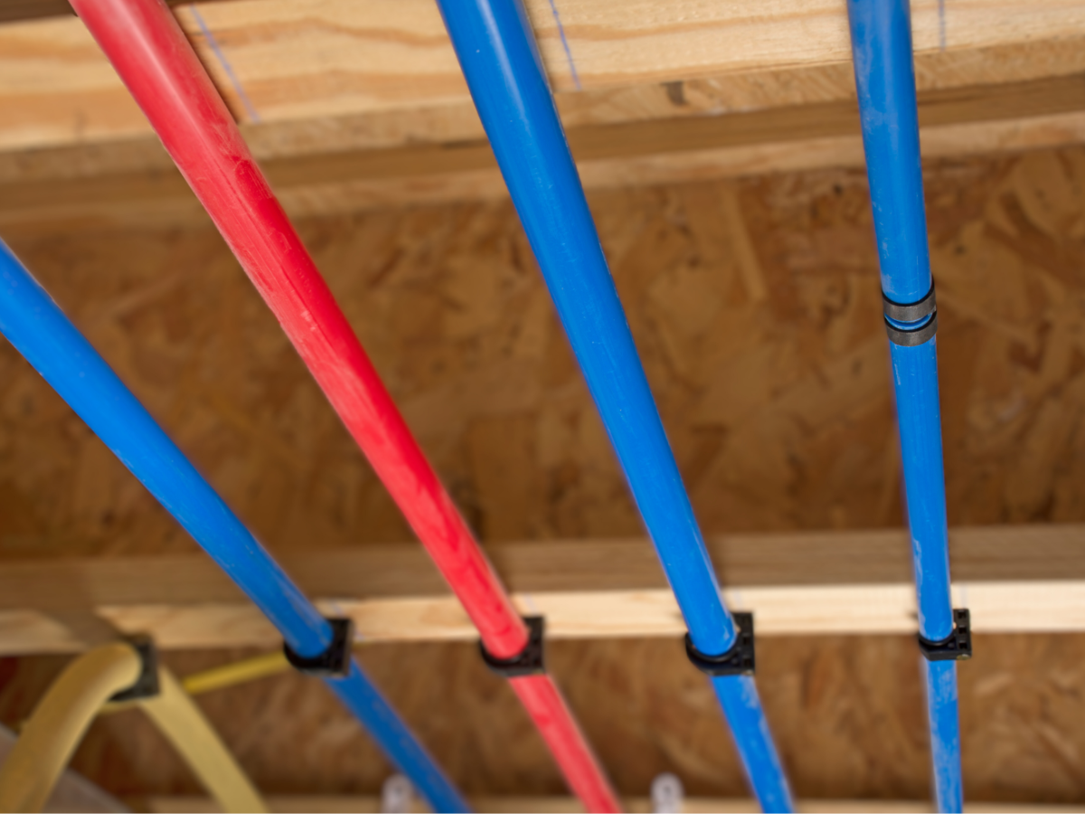 hot and cold PEX water lines running through house
