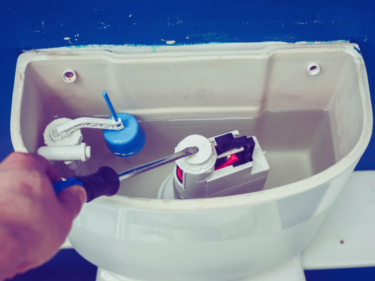 Homeowner trying to fix toilet that is constantly running
